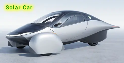 Futuristic solar-powered car on display.