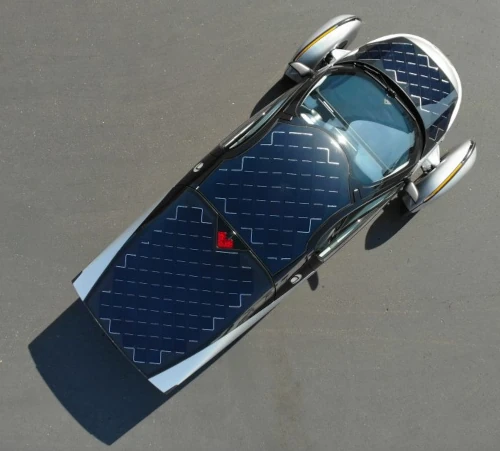 Solar-powered car top view with panels.